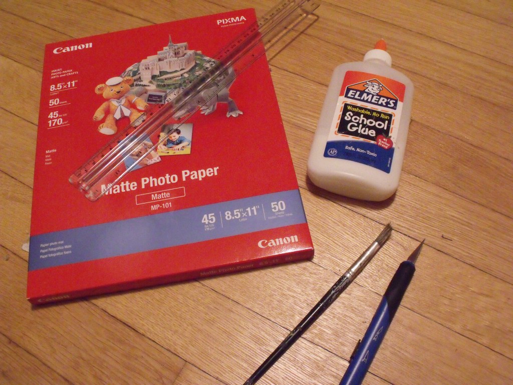 Photo paper, ruler, glue, brush, knife. Steady hands not included. 
